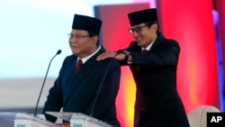 Prabowo Subianto dan Sandiaga Uno.