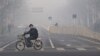 China Urges Public to Walk, Ride Bikes to Help Cut Smog