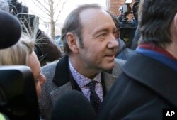 FILE - Actor Kevin Spacey arrives at district court, Jan. 7, 2019 in Nantucket, Massachusetts, to be arraigned on a charge of indecent assault and battery.