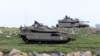 تانک های اسرائیلی در بلندی های جولان در مرز با سوریه