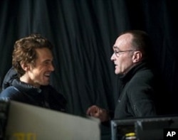 (Left to Right) James Franco and Director Danny Boyle on the set of 127 HOURS
