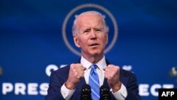 Tổng Thống tân cử Joe Biden loan báo kế hoạch kích thích kinh tế và kiềm chế đại dịch tại Hí viện Queen ở Wilmington, bang Delaware, Hoa Kỳ, ngày 14/1/2021. (Photo by JIM WATSON / AFP)