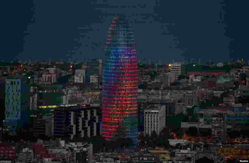 The Agbar tower is illuminated with rainbow colors during World Pride in Barcelona, Spain, June 28, 2017.