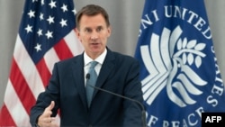 Menteri Luar Negeri Inggris, Jeremy Hunt berbicara tentang kebijakan luar negeri Inggris di Institut Perdamaian AS (US Institute of Peace) di Washington, DC, 21 Agustus 2018.