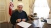 حسن روحانی قانون اجرای برجام را به دستگاه های دولتی ایران ابلاغ کرد