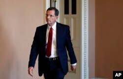 Sen. John Barrasso, R-Wyo., heads to the Senate floor, on Capitol Hill, Oct. 3, 2018 in Washington.