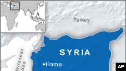 Syrian Activists: Tanks, Troops Raid Hama, Make Arrests