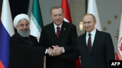 Les présidents turc Recep Tayyip Erdogan, russe Vladimir Poutine et iranien Hassan Rohani à Ankara, le 4 avril 2018.