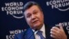 Ukraine Leader Ignores Putin Warning on EU Path