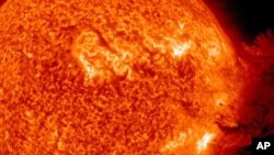 FILE - The Sun unleashed an M-2 (medium-sized) solar flare, an S1-class (minor) radiation storm and a spectacular coronal mass ejection (CME) on June 7. 