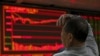 Chứng khoán Trung Quốc ngừng giao dịch sau vụ sụt giá mạnh đầu năm