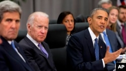 President Barack Obama, accompanied by, from left, Secretary of State John Kerry, Vice President Joe Biden, and National Security Adviser Susan Rice, speaks during a meeting with Chinese President Xi Jinping at the Nuclear Security Summit in Washington, March 31, 2016.