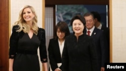 South Korean President Moon Jae-In, his wife Kim Jung-sook and Ivanka Trump arrive for their dinner at the Presidential Blue House in Seoul, South Korea, Feb. 23, 2018.