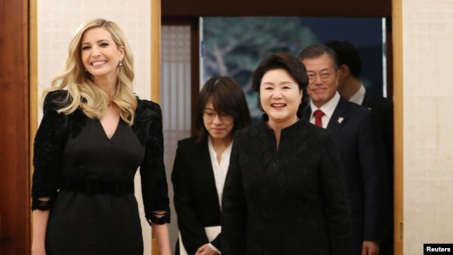 South Korean President Moon Jae-In, his wife Kim Jung-sook and Ivanka Trump arrive for their dinner at the Presidential Blue House in Seoul, South Korea, Feb. 23, 2018.