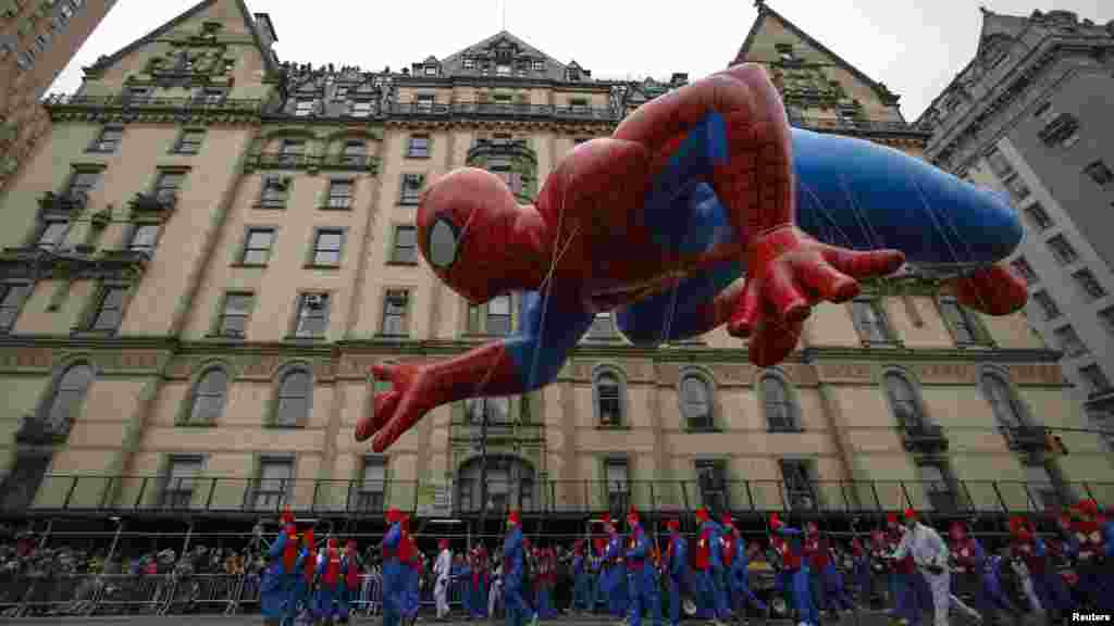 The Spiderman balloon floats down Central Park West during the 88th Macy's Thanksgiving Day Parade in New York, Nov. 27, 2014.