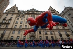 The Spiderman balloon floats down Central Park West during the 88th Macy's Thanksgiving Day Parade in New York, Nov. 27, 2014.
