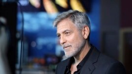 Actor George Clooney talks to reporters on arrival at the premiere of the television mini-series 'Catch22', in London, Wednesday, May 15, 2019. (Photo by Grant Pollard/Invision/AP)