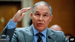 FILE - Environmental Protection Agency administrator Scott Pruitt testifies before the Senate Environment Committee on Capitol Hill in Washington, Jan. 30, 2018.