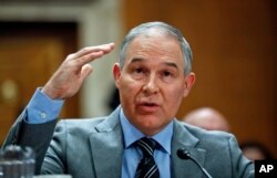 FILE - Environmental Protection Agency administrator Scott Pruitt testifies before the Senate Environment Committee on Capitol Hill in Washington, Jan. 30, 2018.