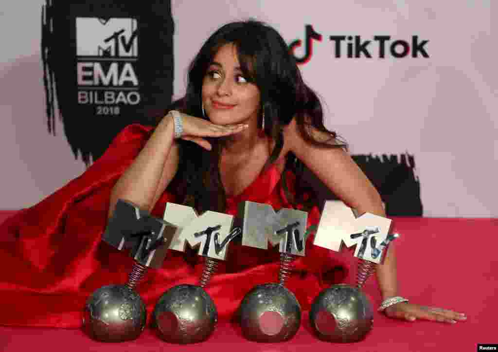 Camila Cabello poses with her awards during the 2018 MTV Europe Music Awards at Bilbao Exhibition Centre in Bilbao, Spain, Nov. 4, 2018.