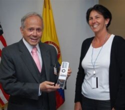 Hernando Henao with Bridget Gersten, press attache at the American Embassy in Bogota, Colombia.