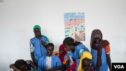 Students from CEM Serigne Bassirou Mbacke school in Kaolack, Senegal, test at their robot at the 2017 Pan-African Robotics Competition in Dakar, Senegal, May 19, 2017. (R. Shryock/VOA)