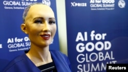 Sophia, a robot displayed at a technology conference in Riyadh, Saudi Arabia, last week, is seen during a presentation at the "AI for Good" Global Summit in Geneva, Switzerland, June 7, 2017.