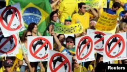 FILE - Demonstrators attend a protest against Brazil's President Dilma Rousseff, part of nationwide protests calling for her impeachment, at Paulista Avenue in Sao Paulo's financial center, Brazil, Aug. 16, 2015.