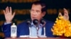 In this file photo taken on March 22, 2019, Cambodia's Prime Minister Hun Sen delivers a speech during a groundbreaking ceremony to build the country's first expressway, in Kampong Speu province, south of Phnom Penh, Cambodia.