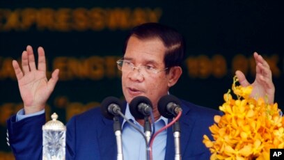 FILE: Cambodia's Prime Minister Hun Sen delivers a speech during a groundbreaking ceremony to build the country's first expressway, in Kampong Speu province, south of Phnom Penh, Cambodia, Friday, March 22, 2019.