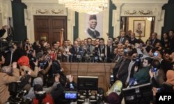 Hani Sarie-Eldin, member of the Supreme Committee of the Wafd Party, speaks to the press at the headquarters of the party following a meeting, in the capital Cairo, on Jan. 27, 2018.