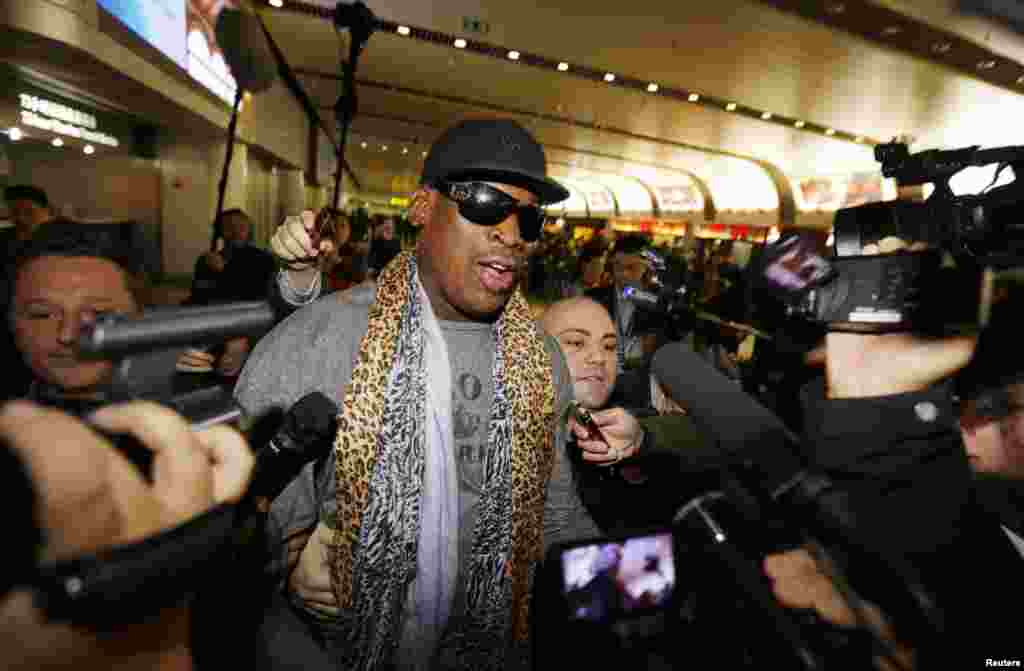 Dennis Rodman speaks to the media after returning from his trip to North Korea at Beijing airport, China, Dec. 23, 2013.&nbsp;