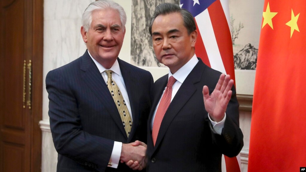 Image result for photos of tillerson in china