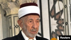 FILE-Syrian cleric Mohammed al-Buti speaking at a mosque.