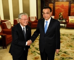 中國總理李克強在北京中南海會晤到訪的日本經濟團體聯合會會長中西宏明。（2018年10月10日）