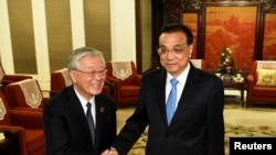 中國總理李克強在北京中南海會晤到訪的日本經濟團體聯合會會長中西宏明。（2018年10月10日）