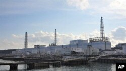 Pusat reaktor nuklir Nomer 1 di PLTN Daiichi yang dioperasikan oleh TEPCO di kota Okuma, Fukushima rusak berat terkena hantaman Tsunami tahun lalu (Foto: dok). 