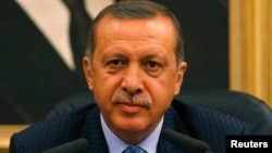 Turkey's Prime Minister Tayyip Erdogan Erdogan calls for the U.N. Security Council to convene quickly and act after what he described as a massacre in Egypt, during a news conference in Ankara, Turkey, Aug. 15, 2013.
