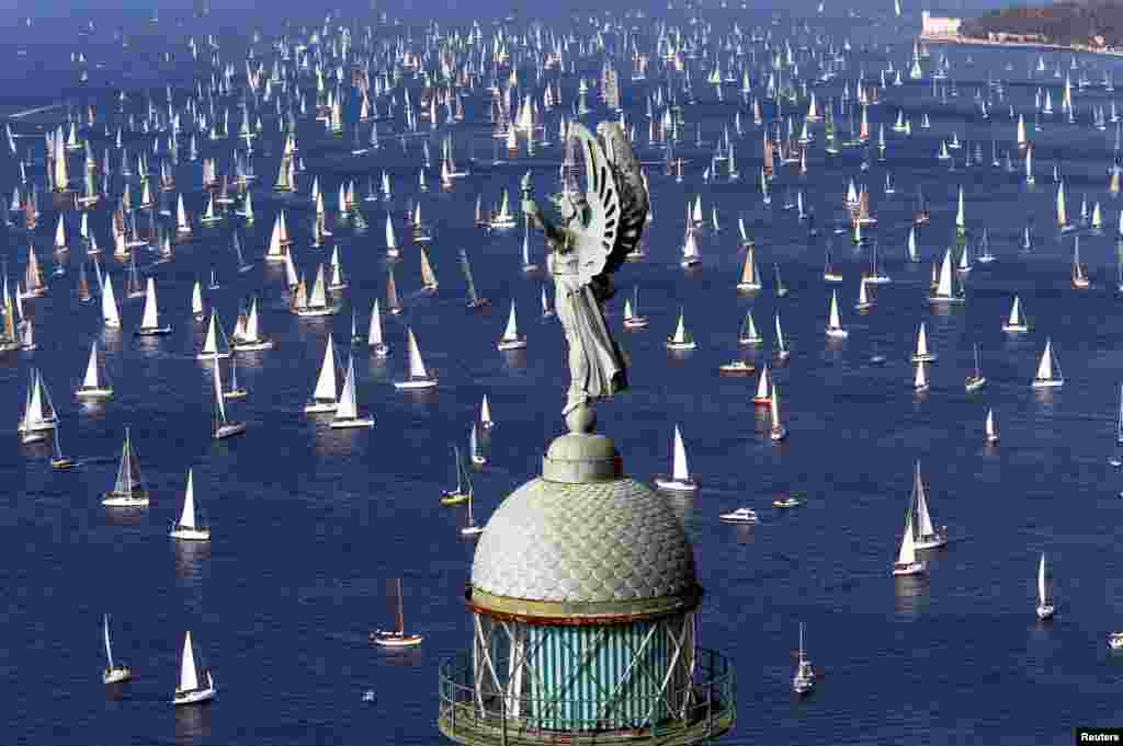 Sailing boats gather at the start of the Barcolana regatta in front of Trieste harbour, Italy, Oct, 9, 2016.