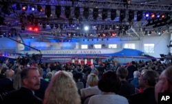 The audience prepares for the start of the CNN Republican presidential debate at the Ronald Reagan Presidential Library and Museum in Simi Valley, California, Sept. 16, 2015.