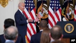 President Joe Biden arrives to speak before signing an executive order aimed at promoting competition in the economy, in the State Dining Room of the White House, Friday, July 9, 2021, in Washington. (AP Photo/Evan Vucci)