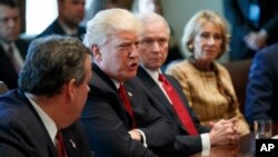 President Donald Trump speaks during an opioid and drug abuse listening session, March 29, 2017, in the Cabinet Room of the White House in Washington. From left are, New Jersey Governor Chris Christie, Trump, Attorney General Jeff Sessions, and Education 