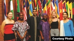 FILE - Berea College international students stand in front of the flags representing the 70 countries where they are from. (Handout photo from Berea)
