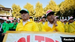 Farmers attend a rally against Japan participating in rule-making negotiations for the U.S.-led Trans-Pacific Partnership (TPP) in Tokyo.