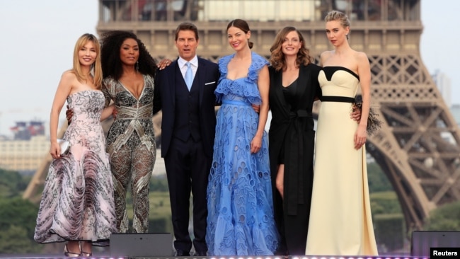 Cast members Tom Cruise, Alix Benezech, Angela Bassett, Michelle Monaghan, Rebecca Ferguson and Vanessa Kirby pose during the world premiere of the film "Mission: Impossible - Fallout" in Paris, July 12, 2018.