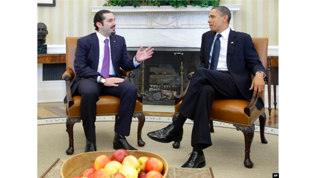 FILE - In this Jan. 12, 2011 photo, President Barack Obama meets with Lebanese Prime Minister Saad Hariri, in the Oval Office of the White House in Washington. Hariri who resigned from Saudi Arabia nearly two weeks ago has been caught in the crossfire between the region’s two feuding powers - Sunni Saudi Arabia and Shiite Iran.