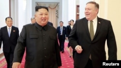 FILE - North Korean leader Kim Jong Un meets with U.S. Secretary of State Mike Pompeo in Pyongyang in this photo released by North Korea's Korean Central News Agency (KCNA), Oct. 7, 2018.