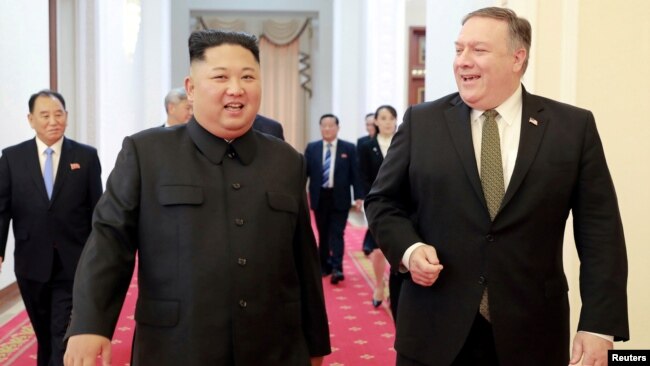 FILE - North Korean leader Kim Jong Un meets with U.S. Secretary of State Mike Pompeo in Pyongyang in this photo released by North Korea's Korean Central News Agency (KCNA), Oct. 7, 2018.