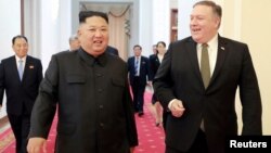 FILE - North Korean leader Kim Jong Un meets with U.S. Secretary of State Mike Pompeo in Pyongyang in this photo released by North Korea's Korean Central News Agency, Oct. 7, 2018.