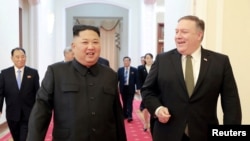 FILE - North Korean leader Kim Jong Un meets with U.S. Secretary of State Mike Pompeo in Pyongyang in this photo released by North Korea's Korean Central News Agency (KCNA), on Oct. 7, 2018. 